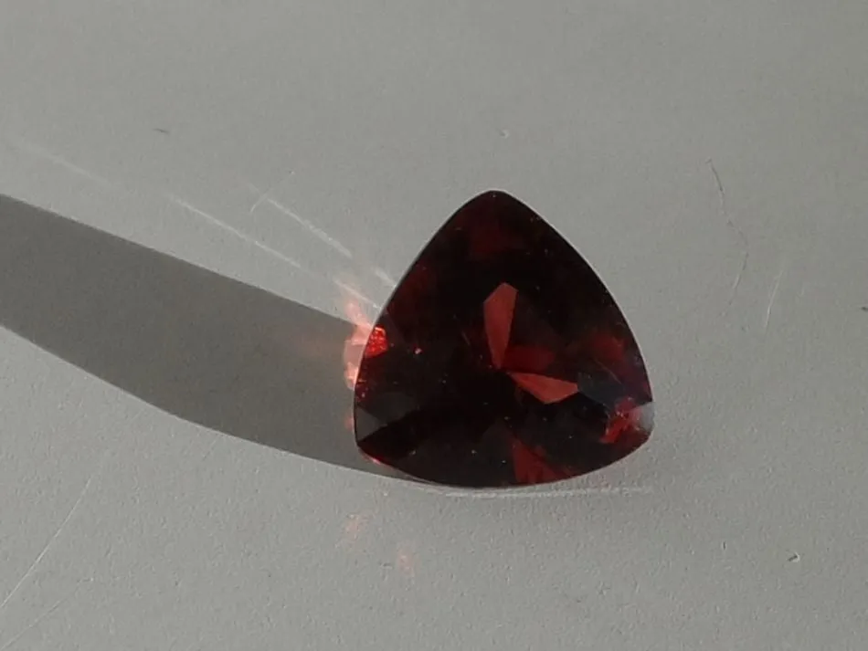 .62 CT. MONTANA GARNET, TRILLION. SUNSET COLOR